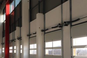 Portoni sezionali Kopron stabilimento Decathlon